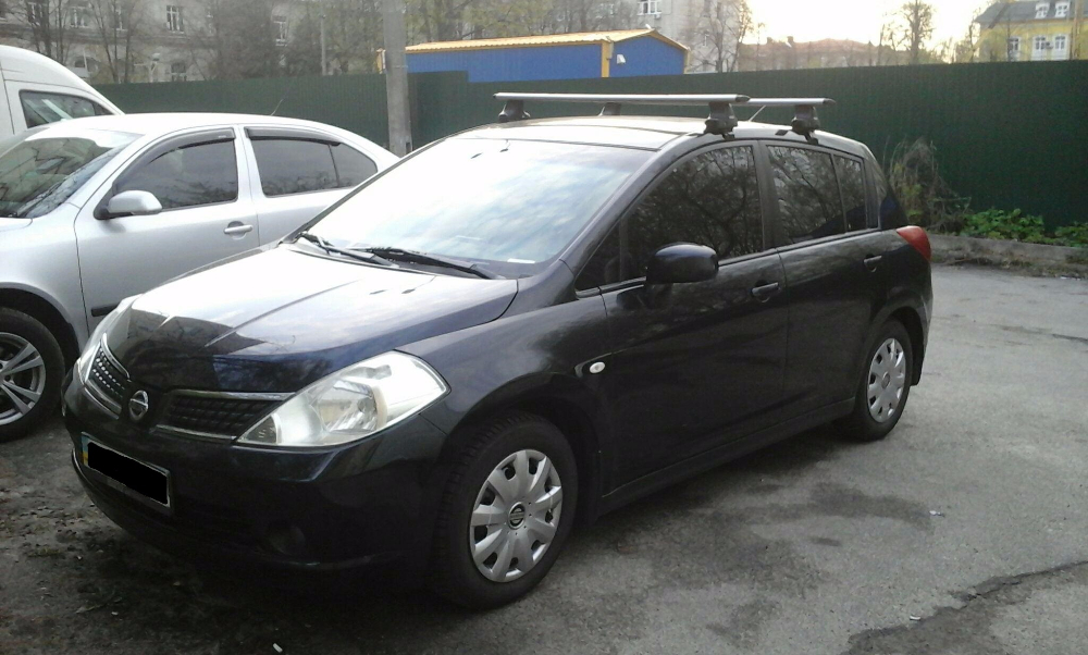 Багажник Thule-754 с поперечинами StreamStyle на Nissan Tiida